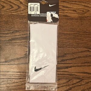 Nike Grey  Headband with Black Logo. Adult unisex.